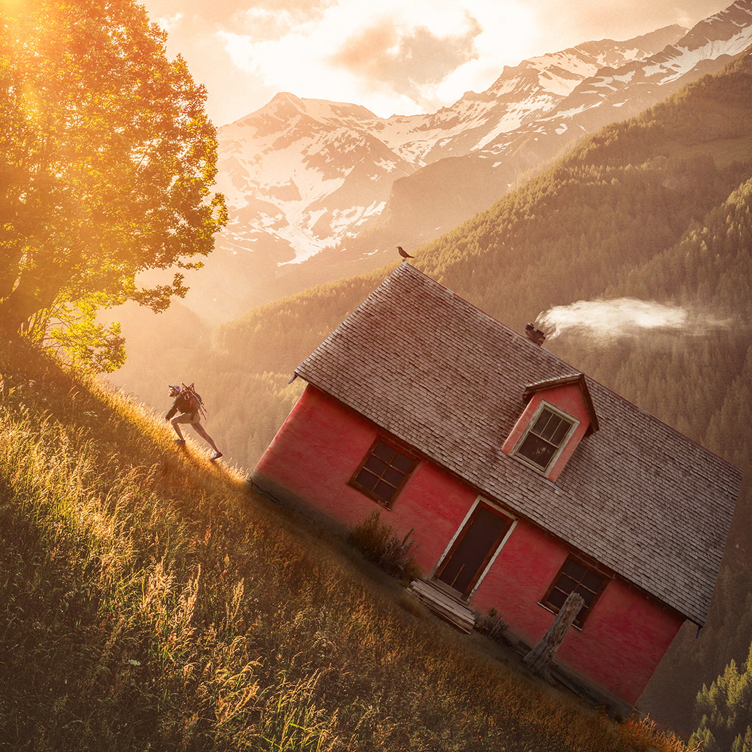 picture of a man and a slanted red house on a hill on a winter yellow afternoon