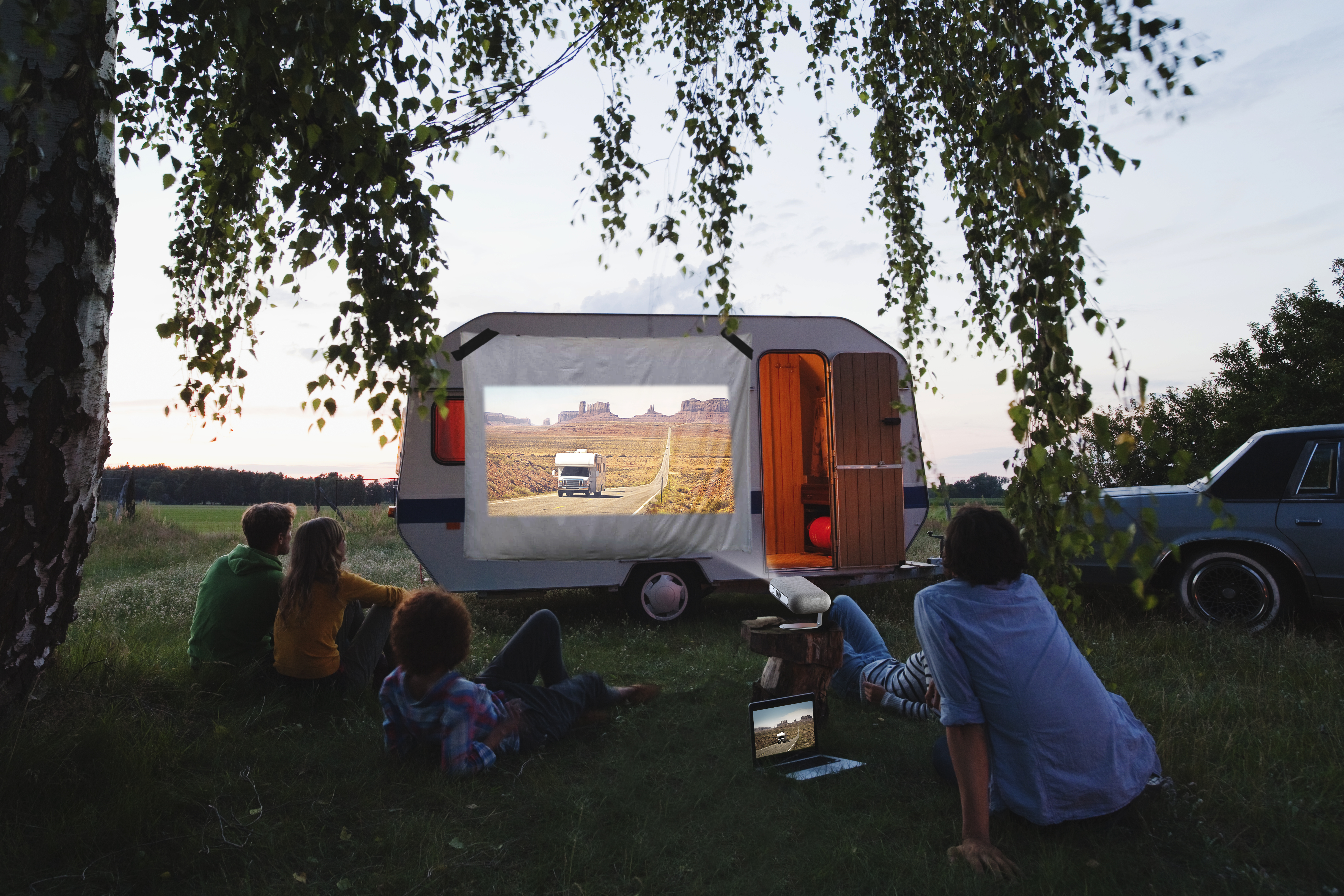 Watching movie outdoor with projector