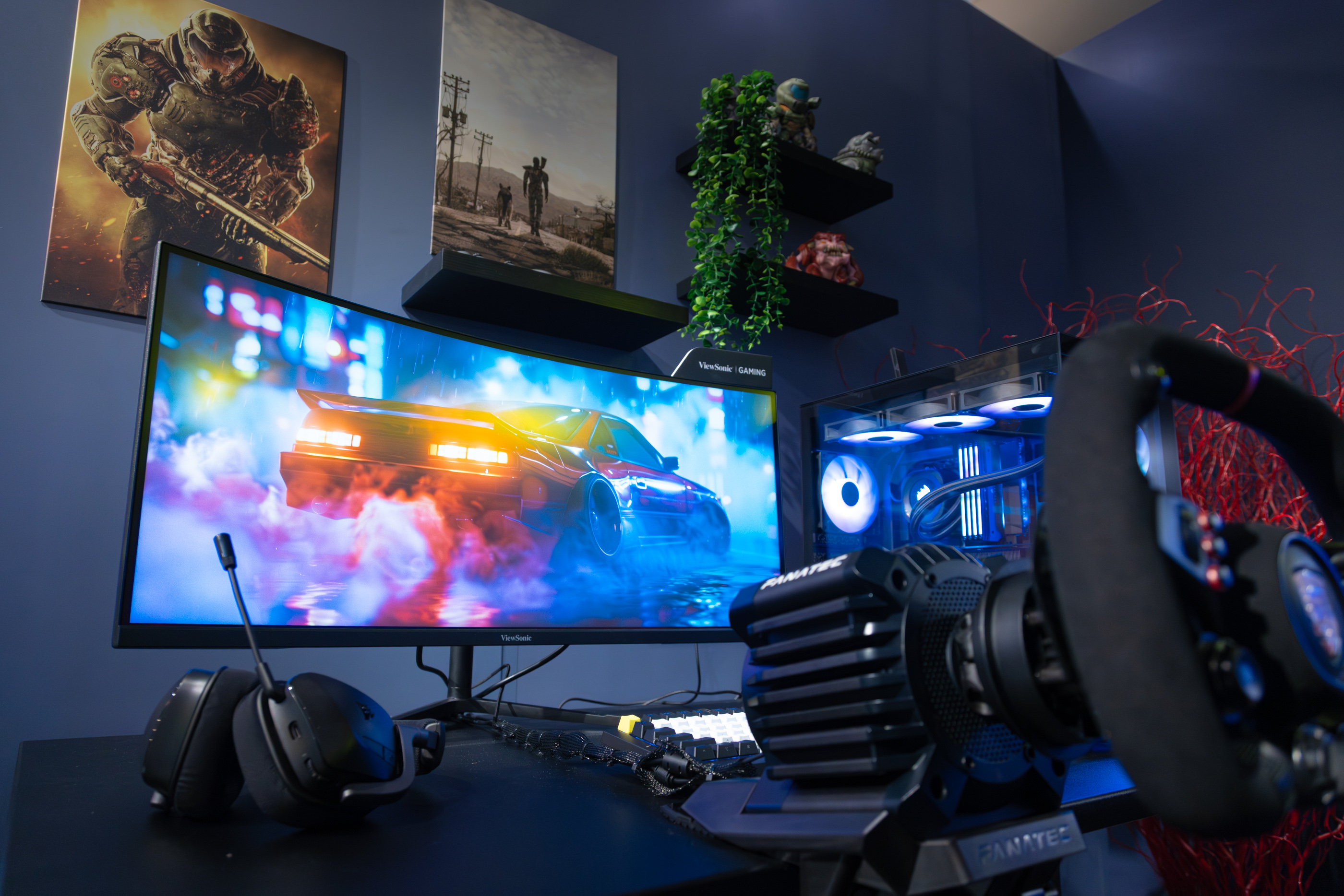 ViewSonic VX3418C-2K Curved Gaming Monitor featured in a racing simulation showcase at CORSAIR’s showroom during COMPUTEX 2026, delivering immersive gaming experiences through its ultra-wide curved display and high-refresh-rate performance.