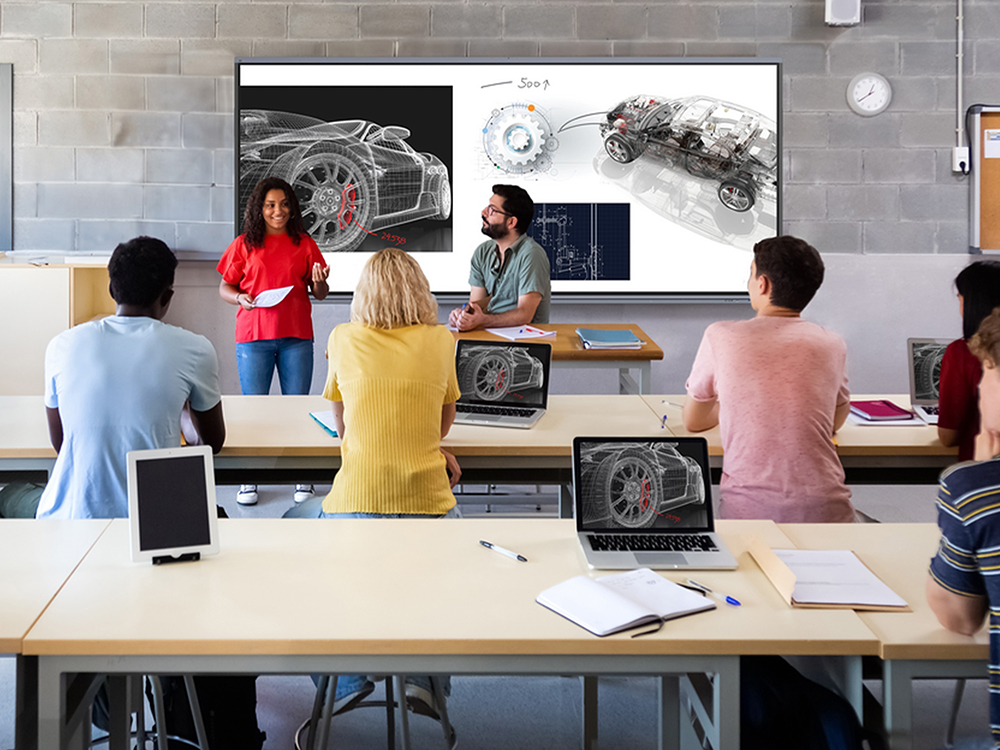 Instructor teaching with a ViewBoard in a classroom of engaged students