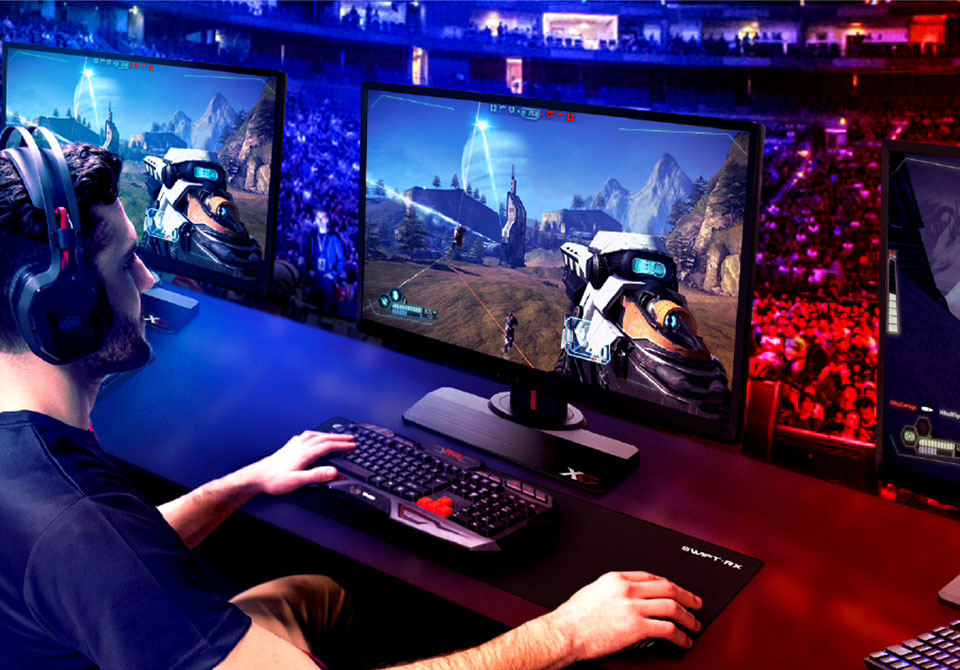 Esports player competing on a gaming monitor in a tournament.