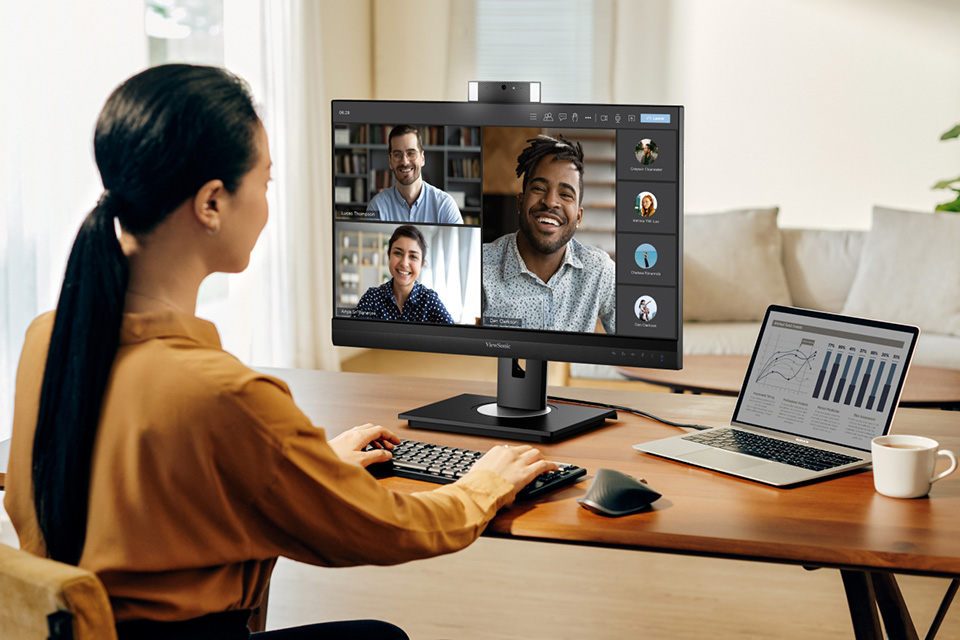 Woman in a video call on a ViewSonic monitor.