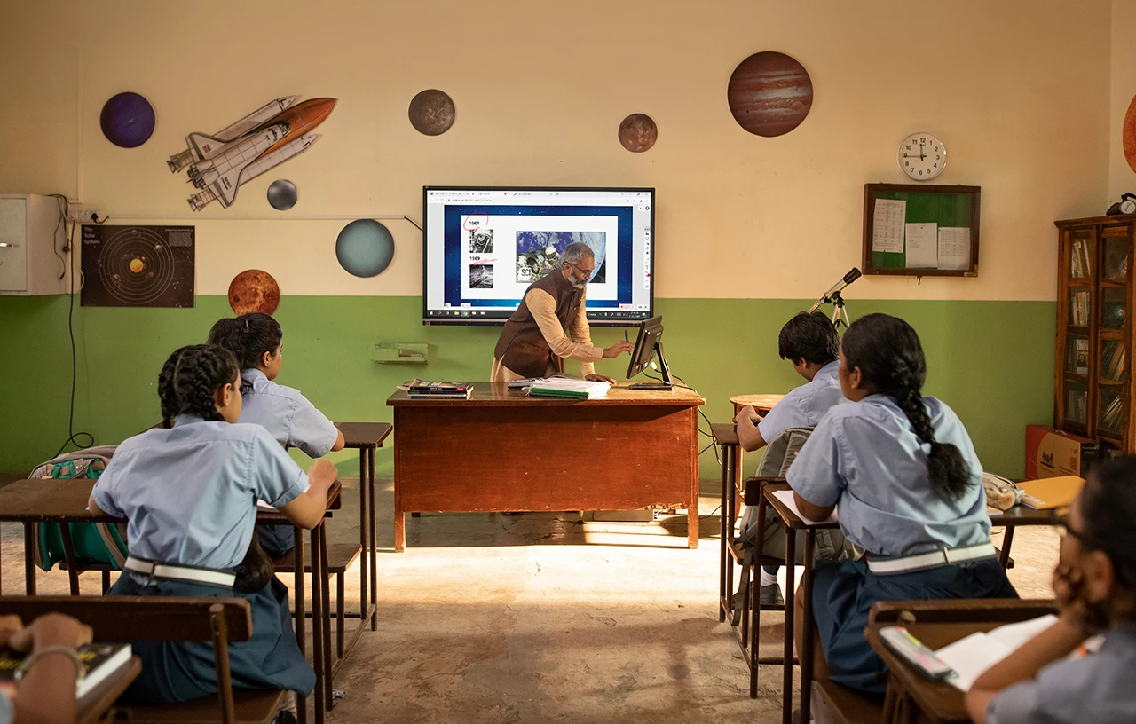 Students engaging in a digital classroom with a ViewBoard display.